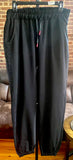 PINK TOP OVER BLACK SWEATS
