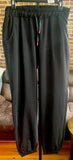 PINK TOP OVER BLACK SWEATS